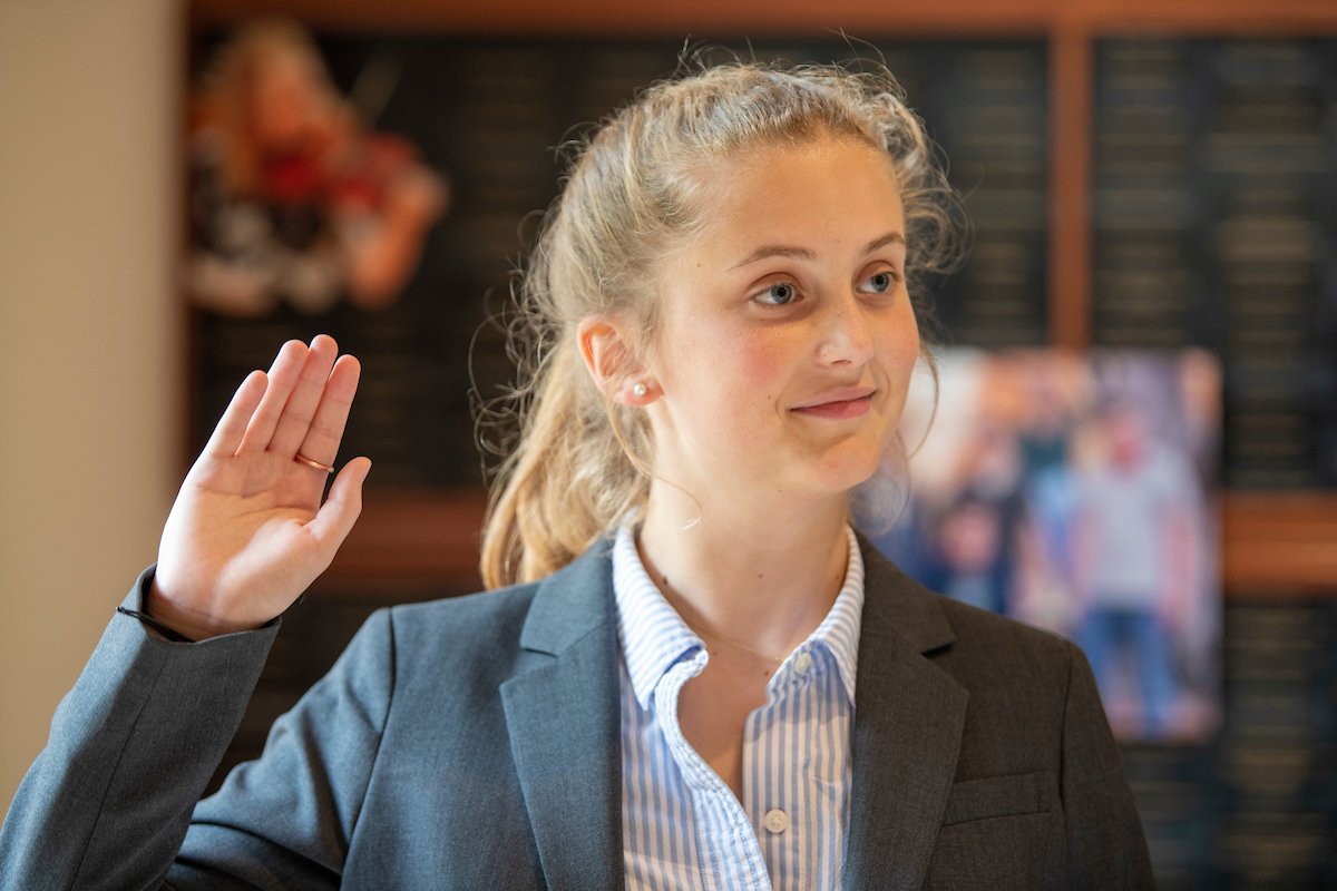 Julia Gately is one of 8 undergraduate students who were recently sworn in as law enforcement officers in the St. Joseph County Cyber Crimes Unit — the only students in the country with that designation.  They participate in every step of a cybercrime case 